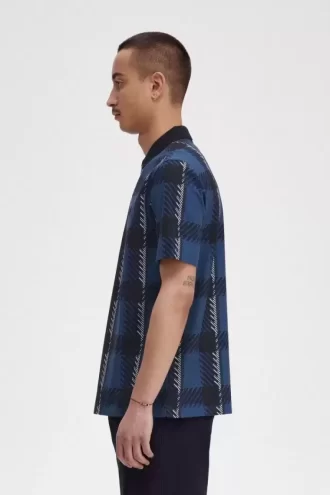 Polo da uomo con zip e scollo a V in tartan Glitch Polo da uomo con zip e scollo a V in tartan Glitch