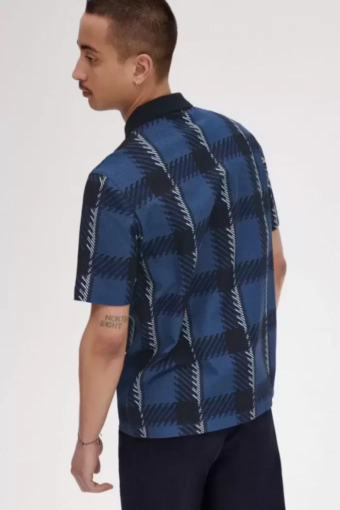 Polo da uomo con zip e scollo a V in tartan Glitch Polo da uomo con zip e scollo a V in tartan Glitch