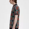 Polo da uomo in tartan con motivo glitch Polo da uomo in tartan con motivo glitch
